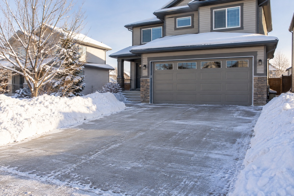Illustrative winter scene of a cleared residential driveway